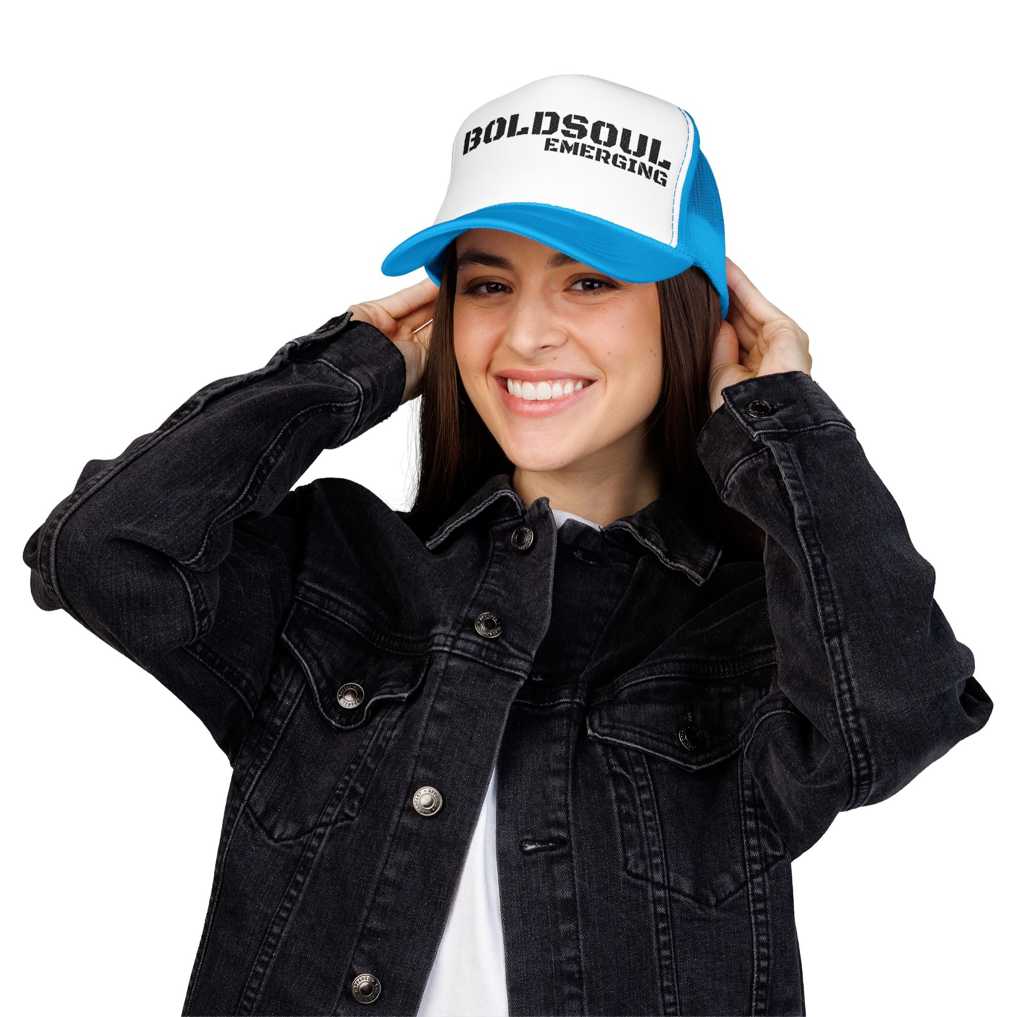 Model wearing BOLDSOUL foam trucker hat in white and hot pink with black text graphic, mesh back, and curved brim