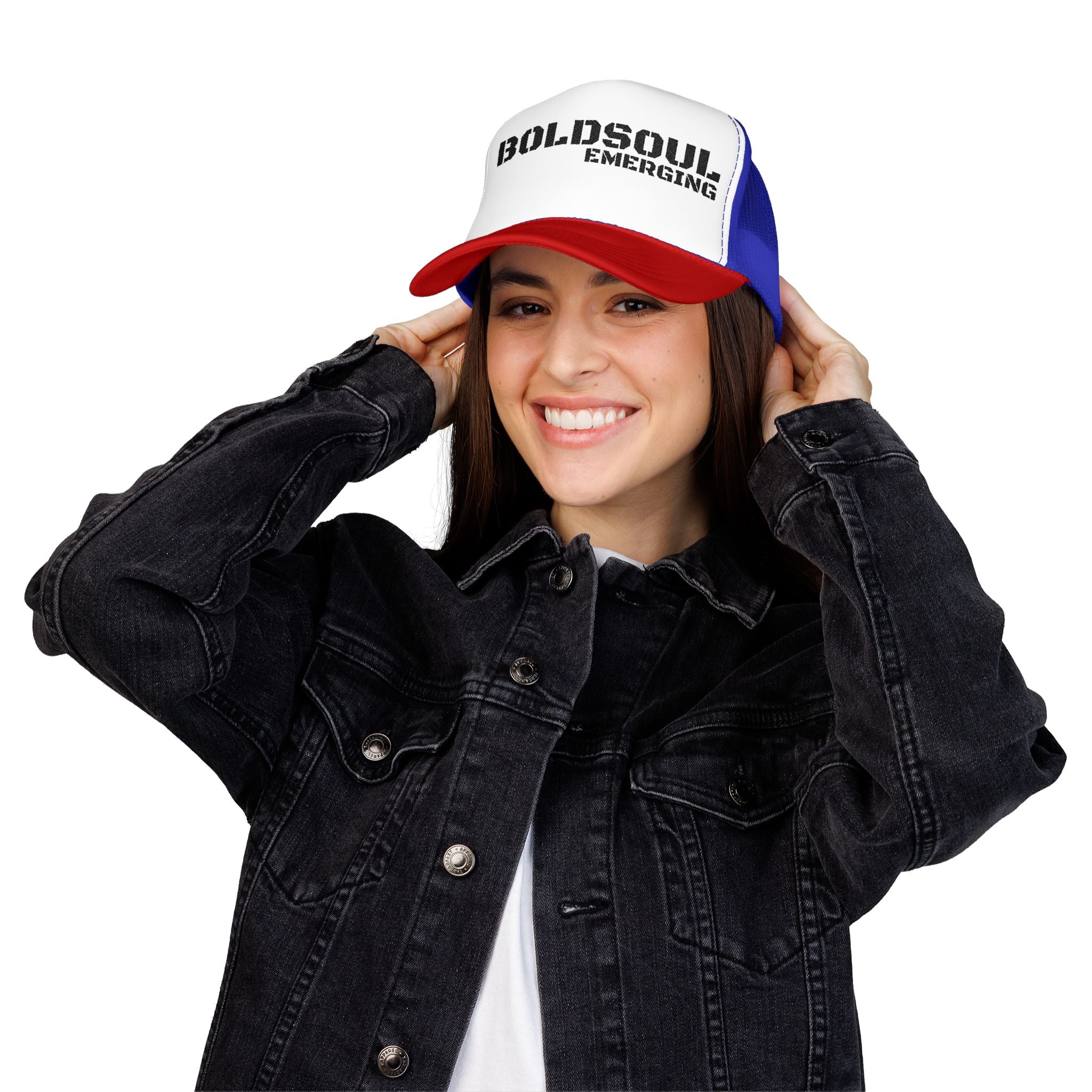Model wearing BOLDSOUL foam trucker hat in white and hot pink with black text graphic, mesh back, and curved brim