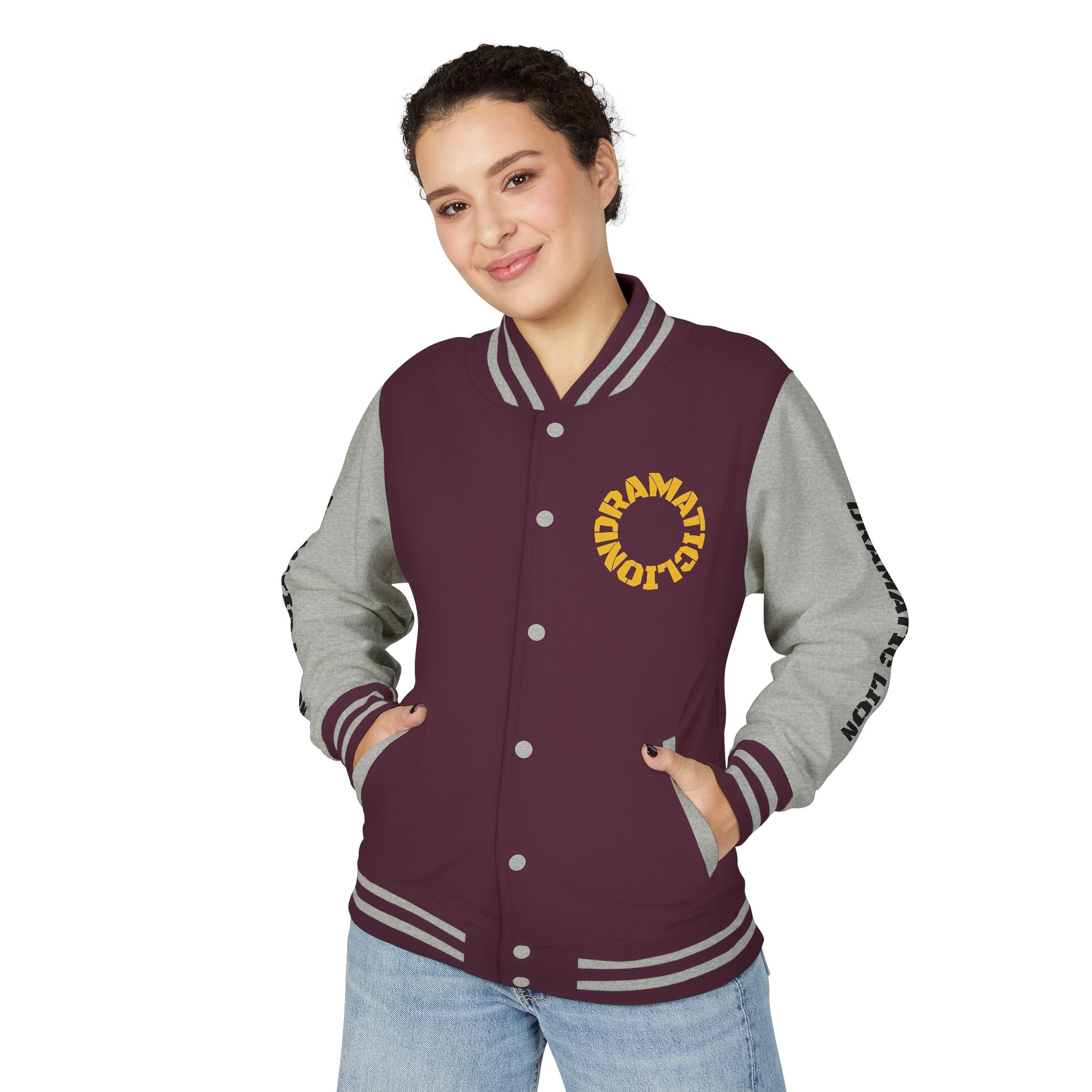 Burgundy and heather gray varsity letterman jacket front view with snap-front closure, striped rib-knit trim, front welt pockets, and circular DRAMATIC LION chest graphic